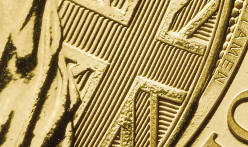 A close up of tincture lines, one of the security features on the Britannia 2021 gold coins. 