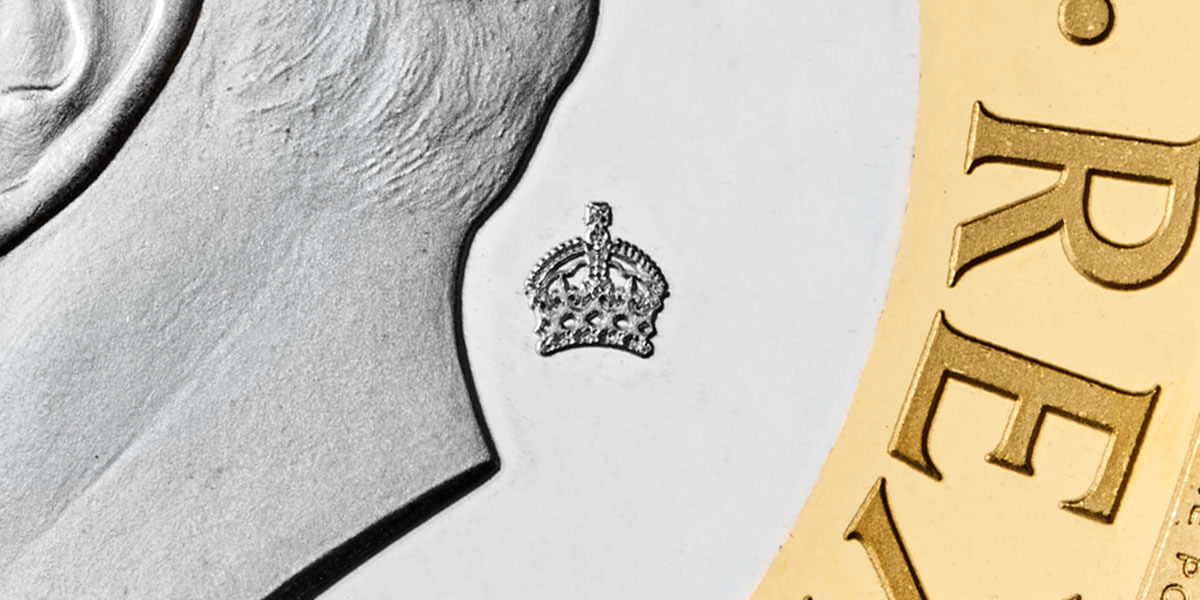 A close up of the 2023 Definitive &pound;2 that highlights a privy mark that features on the coins